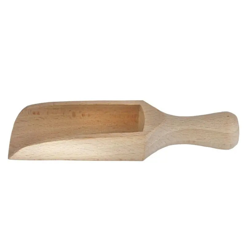 Eco-friendly wooden spice spoon made of natural ash wood on a kitchen counter.